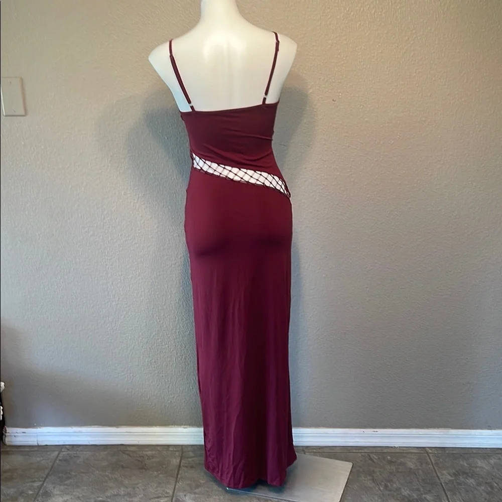 Elegant Asymmetrical Burgundy Dress with Chic Open Areas - Picture 3 of 9